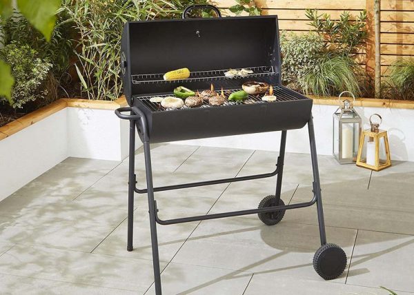 stylish black steel oil drum style charcoal BBQ with a hinged lid1
